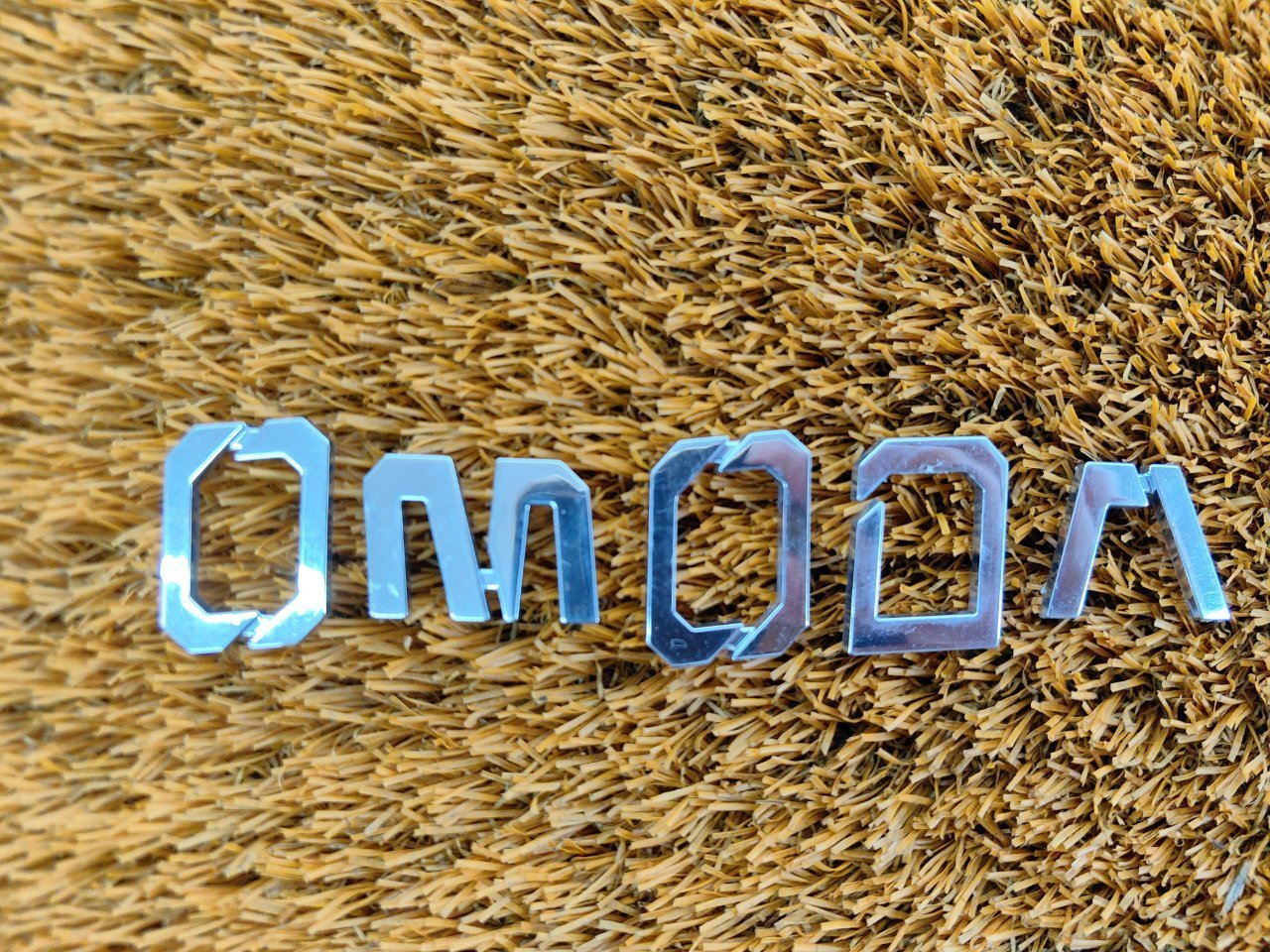 609002307AA Эмблема Omoda S5 2023 фото 4