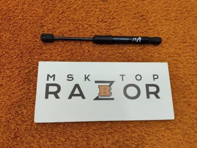 Амортизатор капота