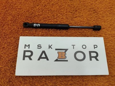 Амортизатор капота
