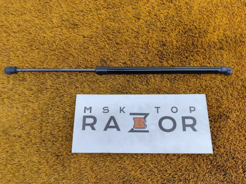 Амортизатор крышки багажника