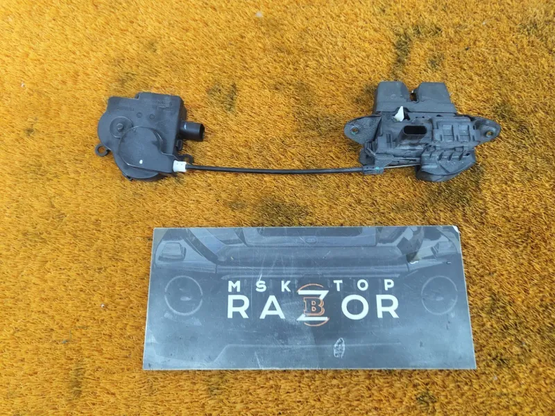 Замок багажника