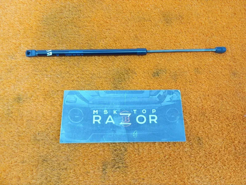 Амортизатор крышки багажника