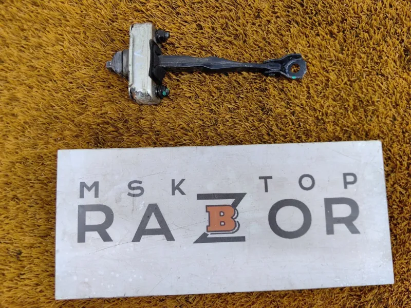 Ограничитель двери