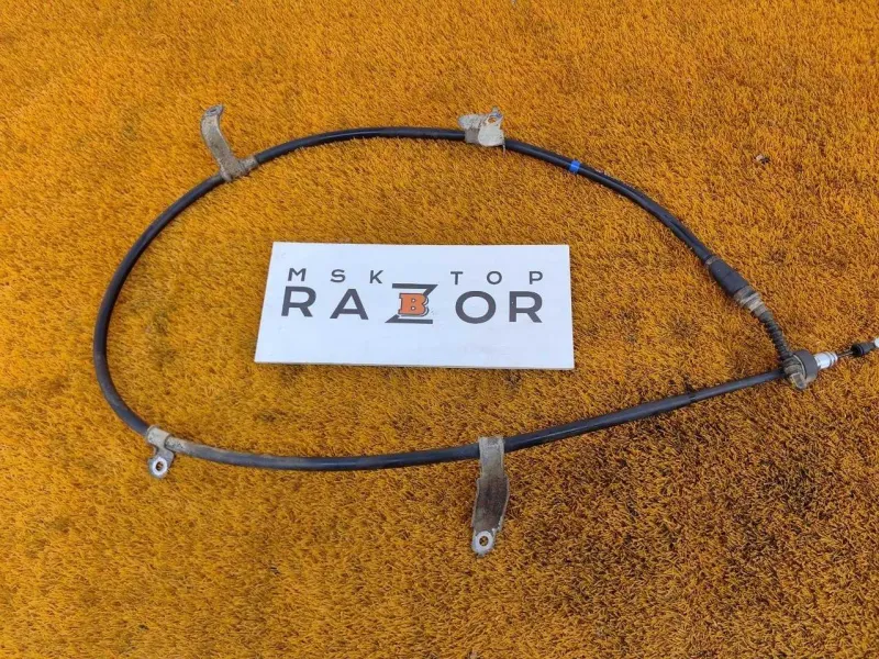 Трос стояночного тормоза