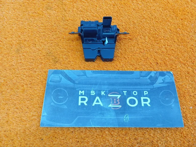 Замок багажника