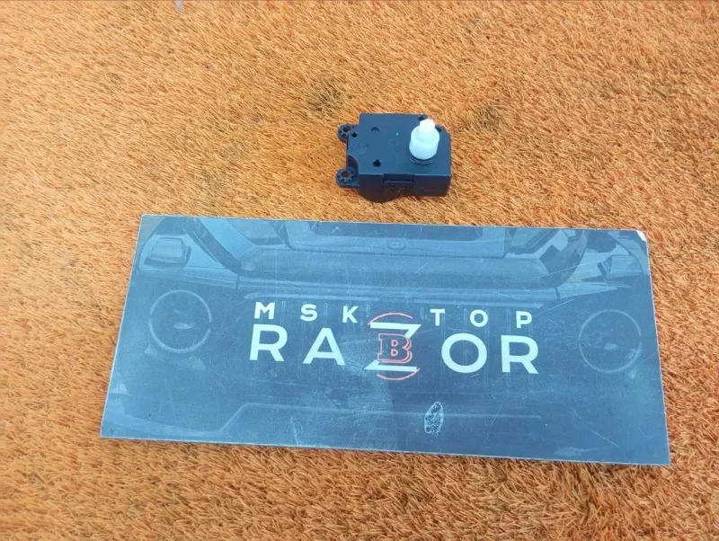 Сервопривод заслонок печки