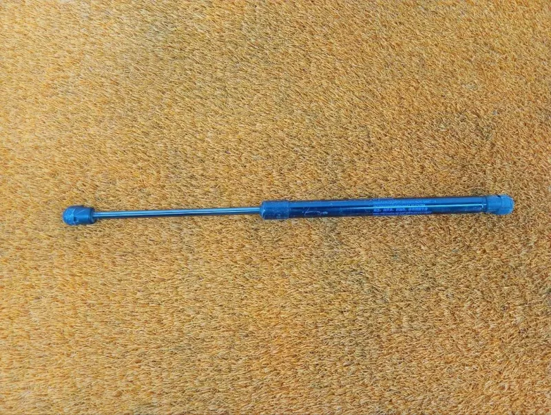 Амортизатор капота