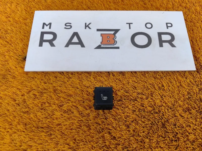 Кнопка обогрева сидений