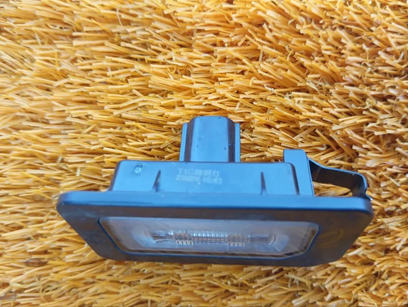 Фонарь подсветки номера