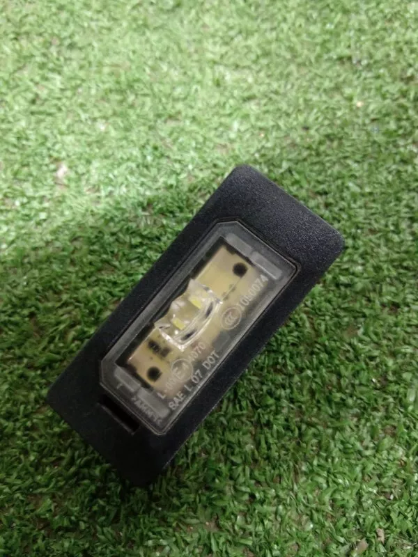 Фонарь подсветки номера