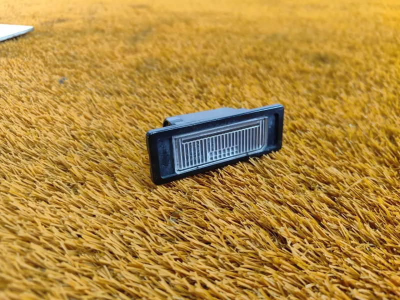 Фонарь подсветки номера