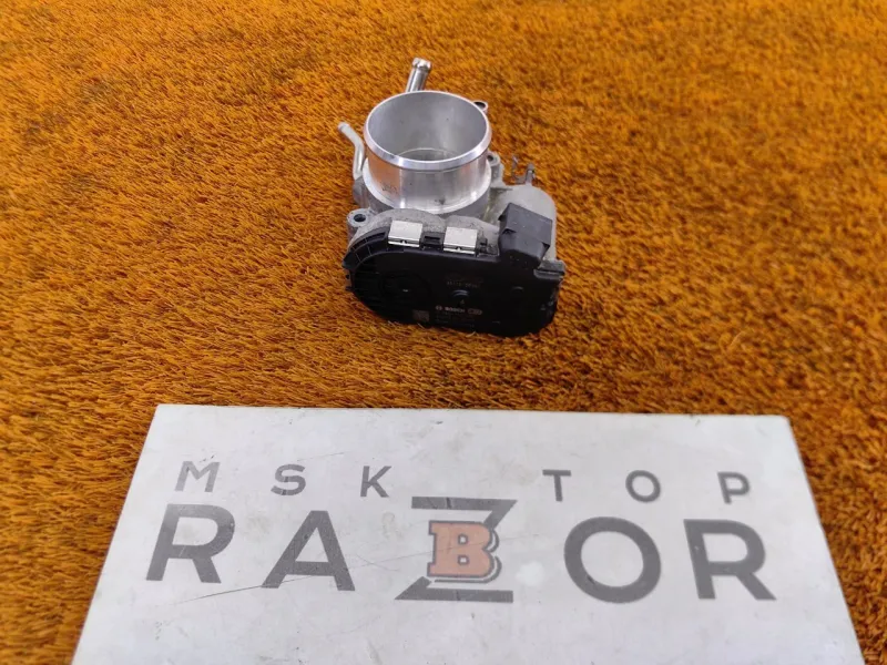 Дроссельная заслонка