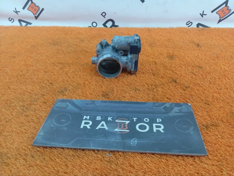 Дроссельная заслонка