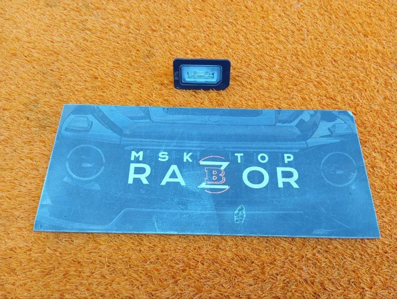 Фонарь подсветки номера