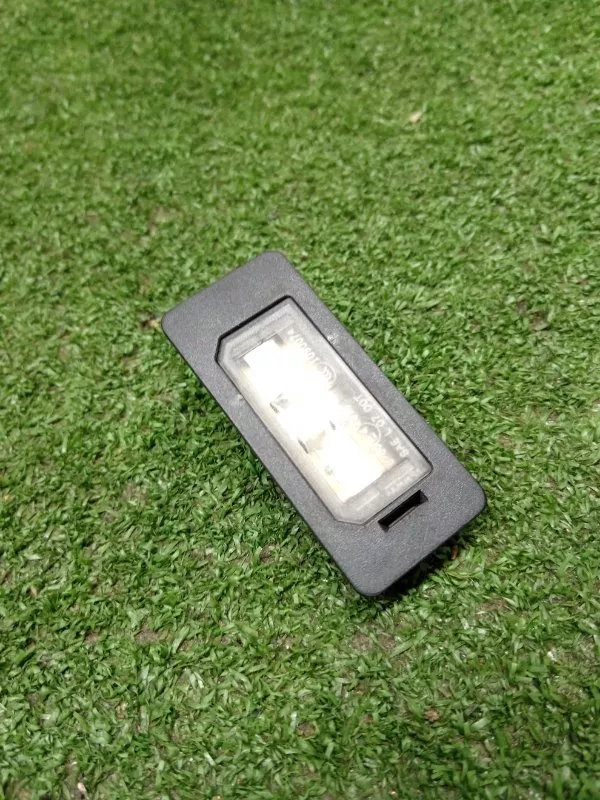 Фонарь подсветки номера