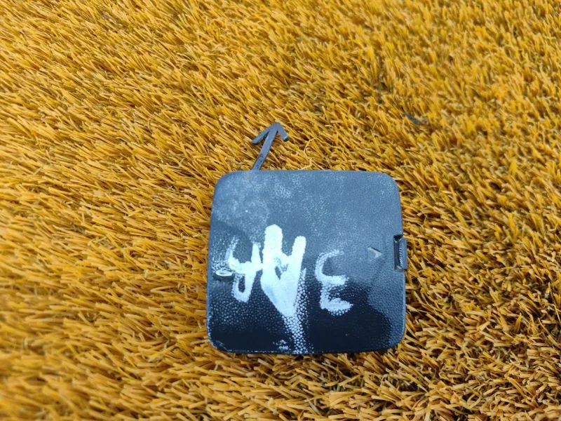 Заглушка буксировочного крюка