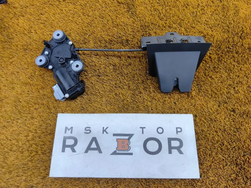 Замок багажника