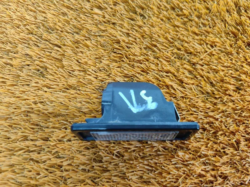 Фонарь подсветки номера