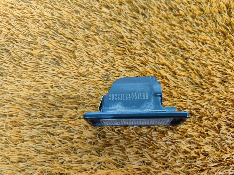 Фонарь подсветки номера