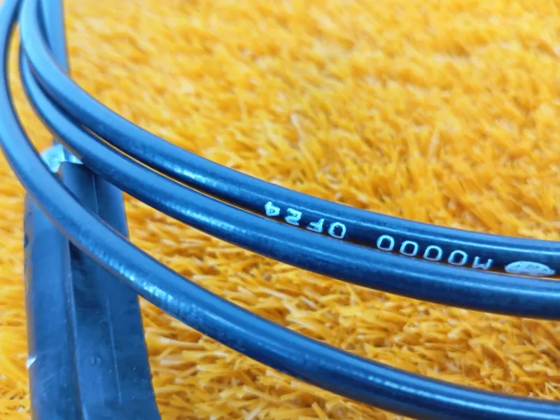 Трос лючка топливного бака