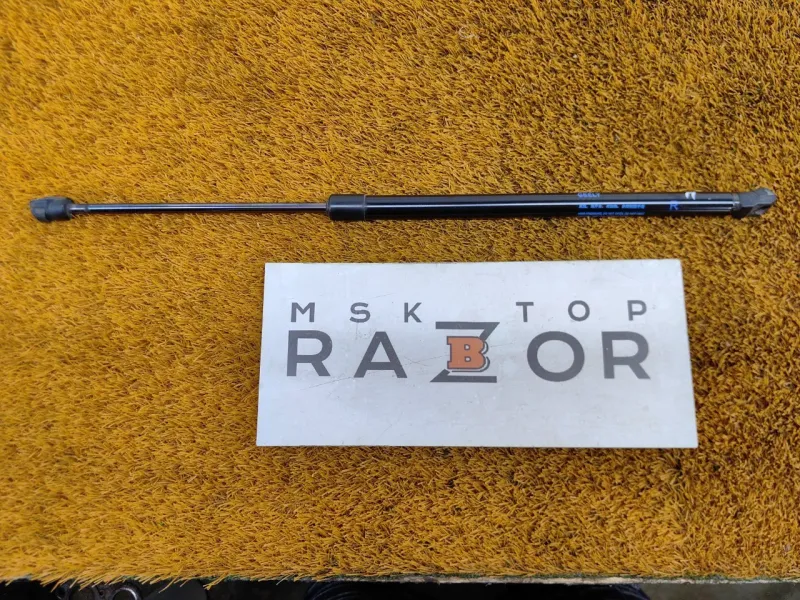 Амортизатор крышки багажника