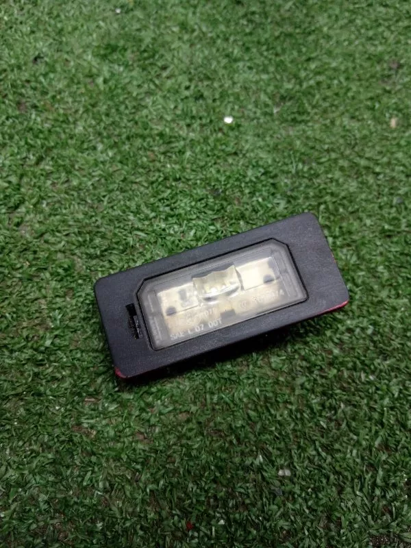 Фонарь подсветки номера