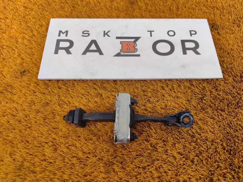 Ограничитель двери