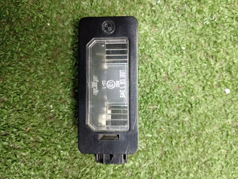 Фонарь подсветки номера