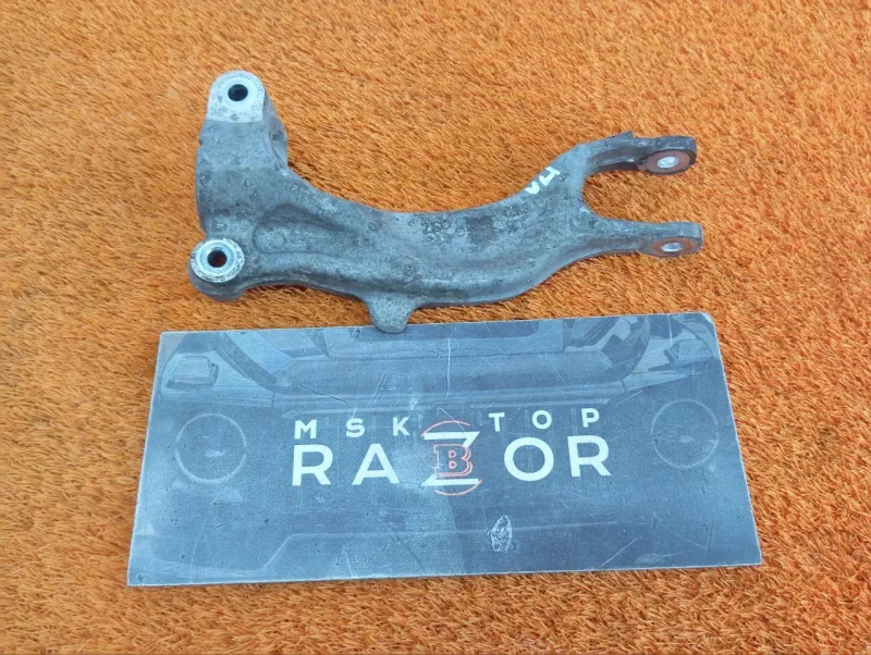 Крепление амортизатора