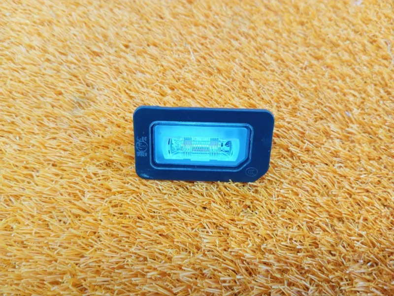 Фонарь подсветки номера