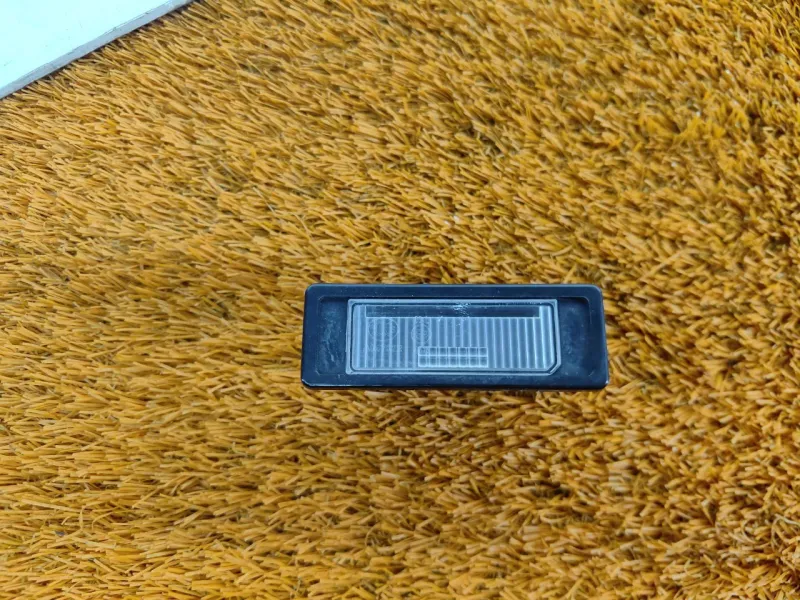 Фонарь подсветки номера