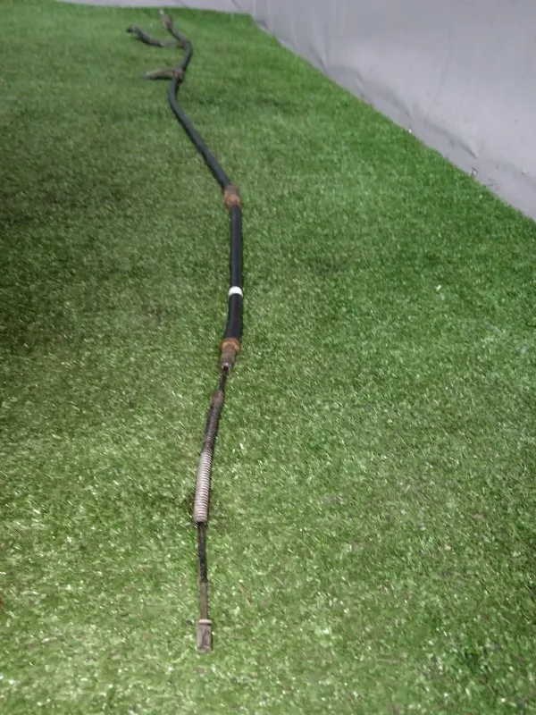 Трос стояночного тормоза