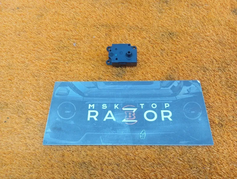 Сервопривод заслонок печки