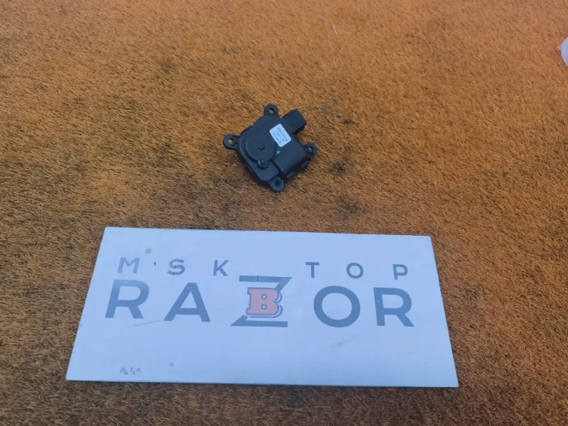 Сервопривод заслонок печки