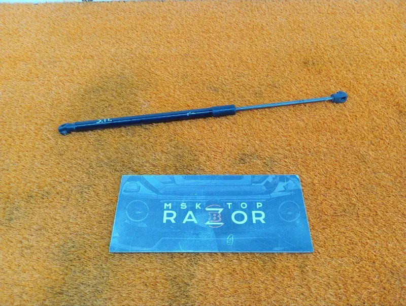 Амортизатор крышки багажника