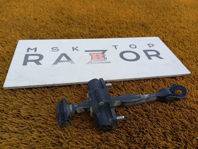 Ограничитель двери