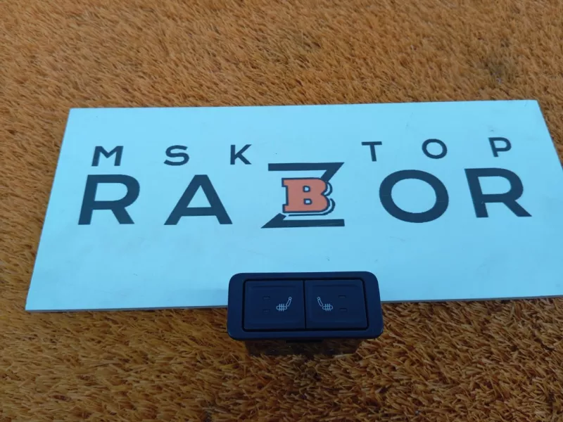 Кнопка обогрева сидений