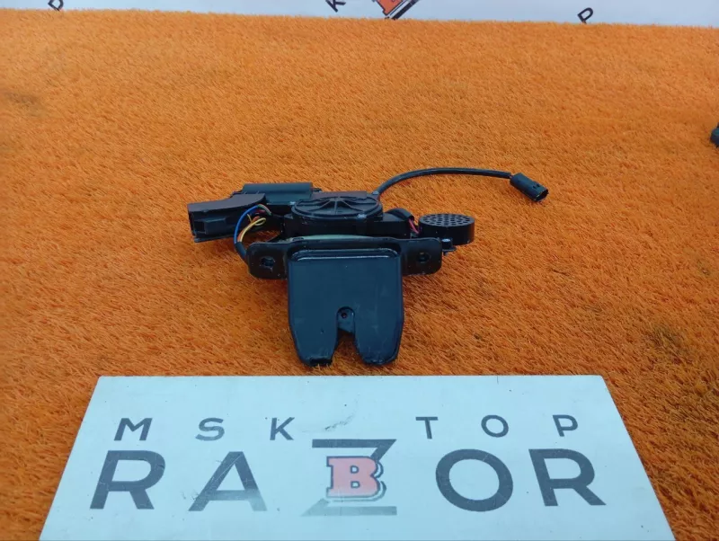 Замок багажника