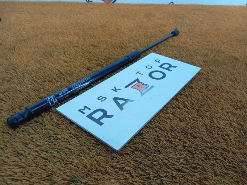 Амортизатор крышки багажника