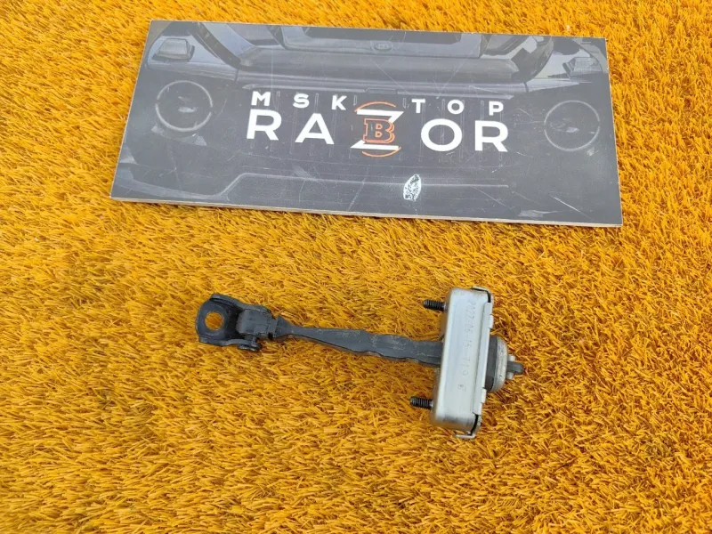 Ограничитель двери