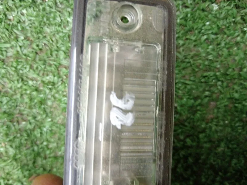 Фонарь подсветки номера