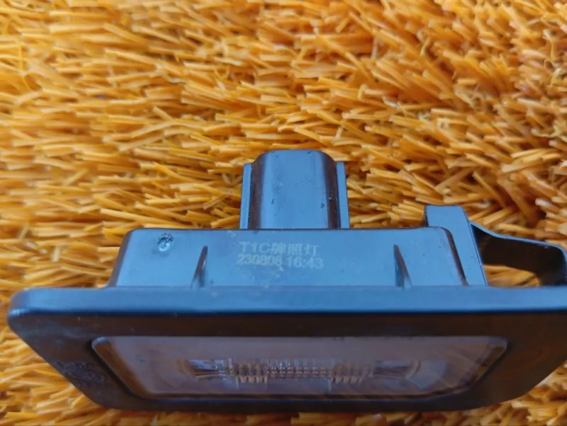 Фонарь подсветки номера