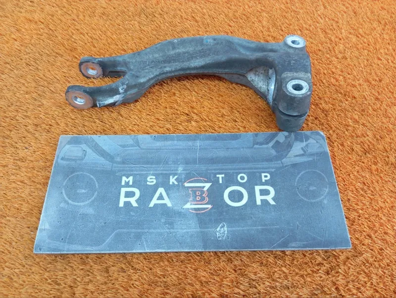 Крепление амортизатора