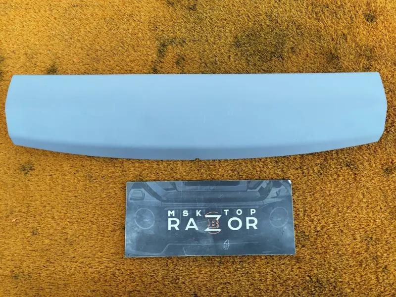 Обшивка двери багажника