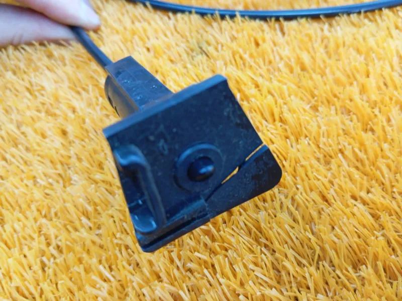 Трос лючка топливного бака