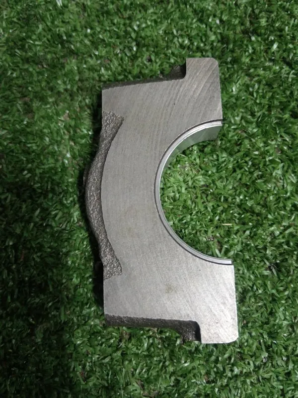 Крышка коренного подшипника коленвала