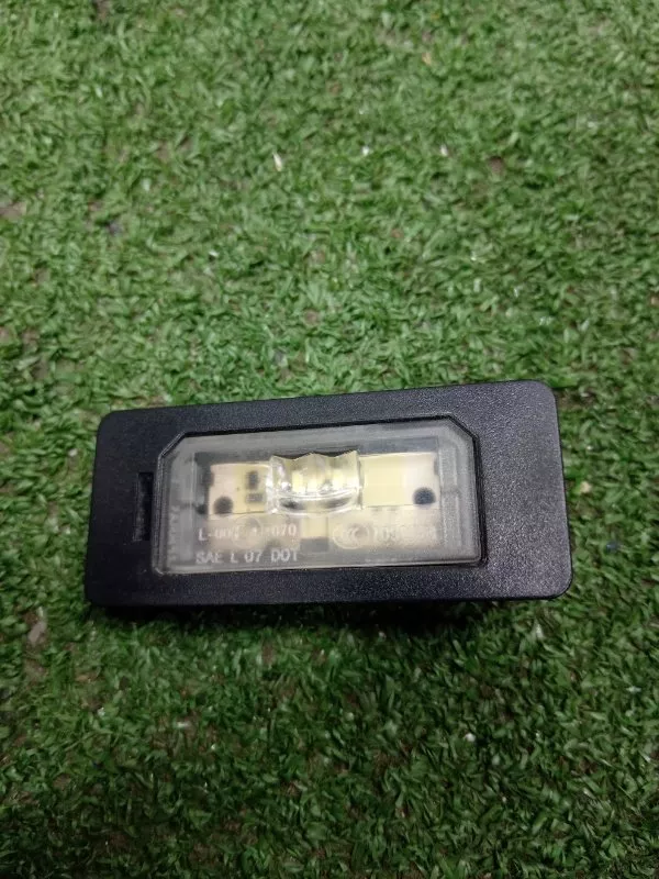 Фонарь подсветки номера