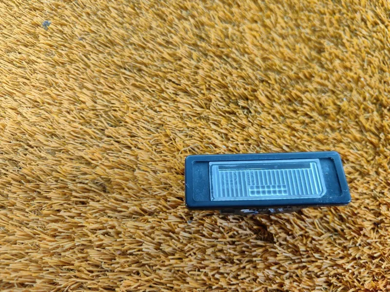 Фонарь подсветки номера