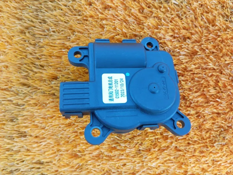 Сервопривод заслонок печки