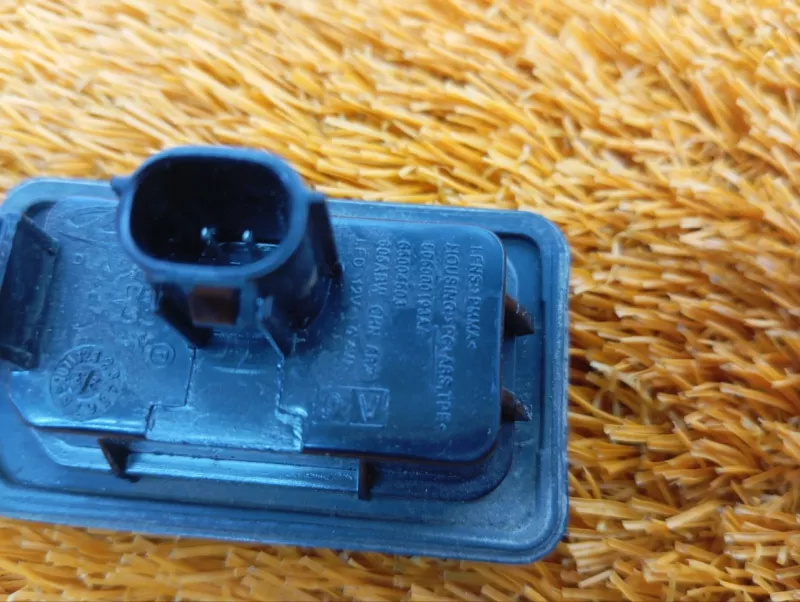 Фонарь подсветки номера